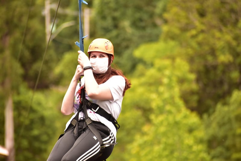 Zip-lining through the forest